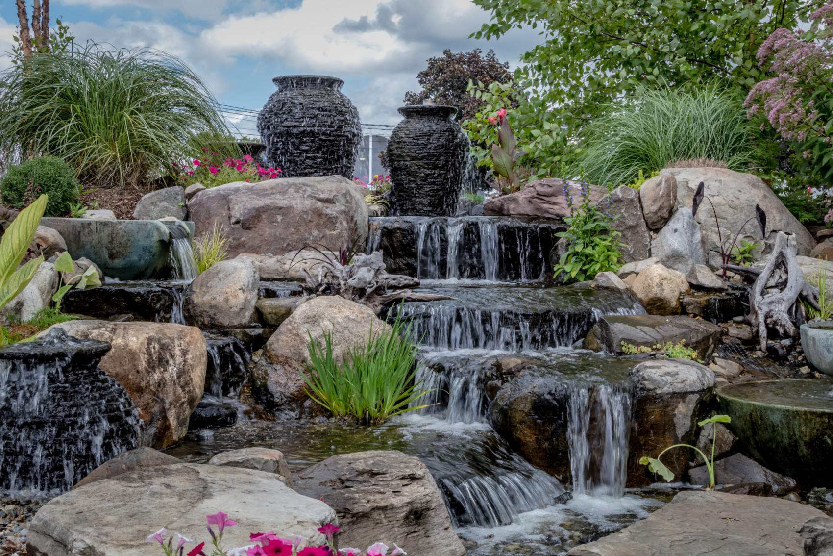 Landscape architecture with waterfall features for summer garden